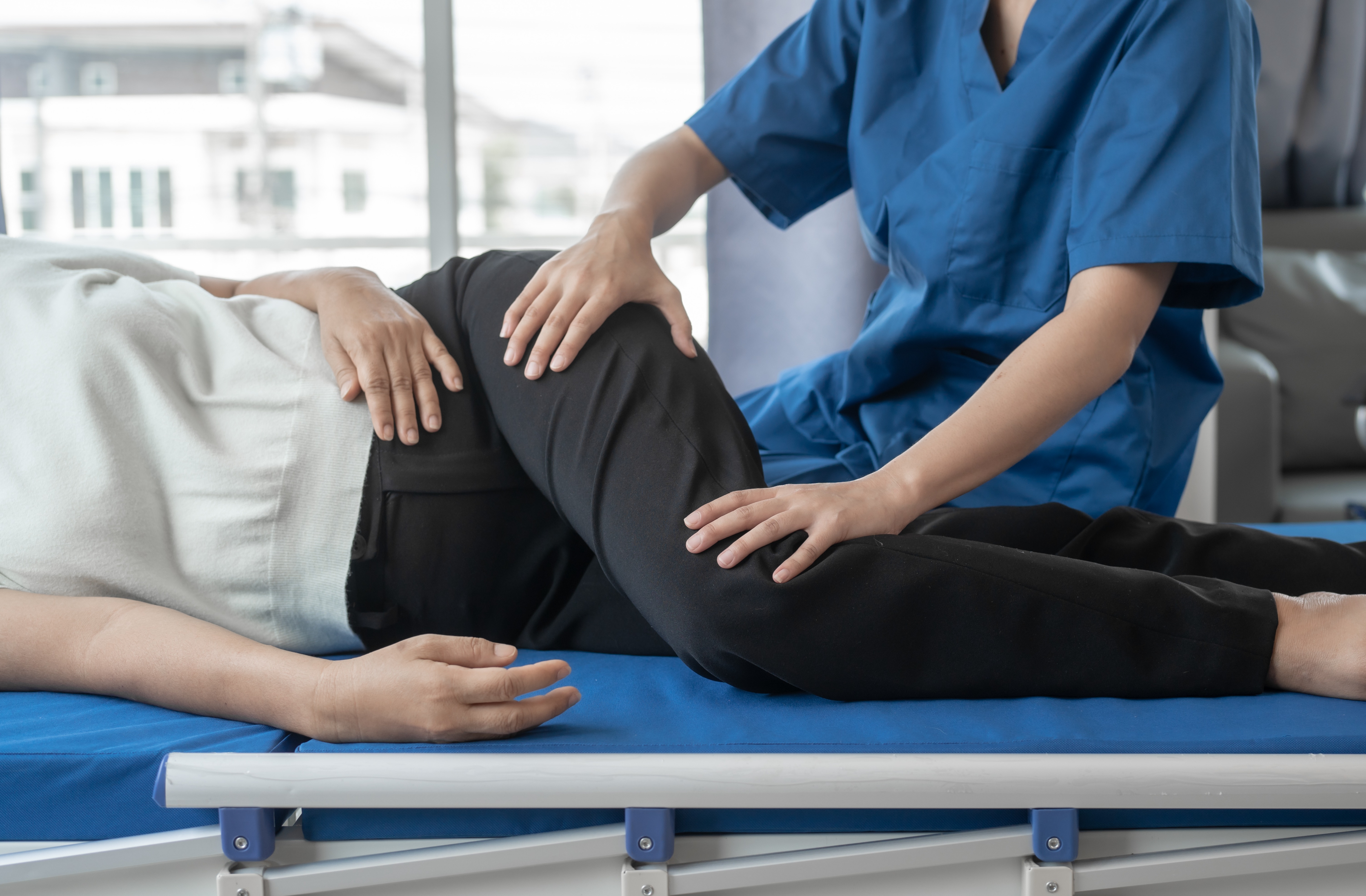 adult-receiving-physical-therapy-on-leg-in-hospita-2026-03-20-01-53-49-utc-1