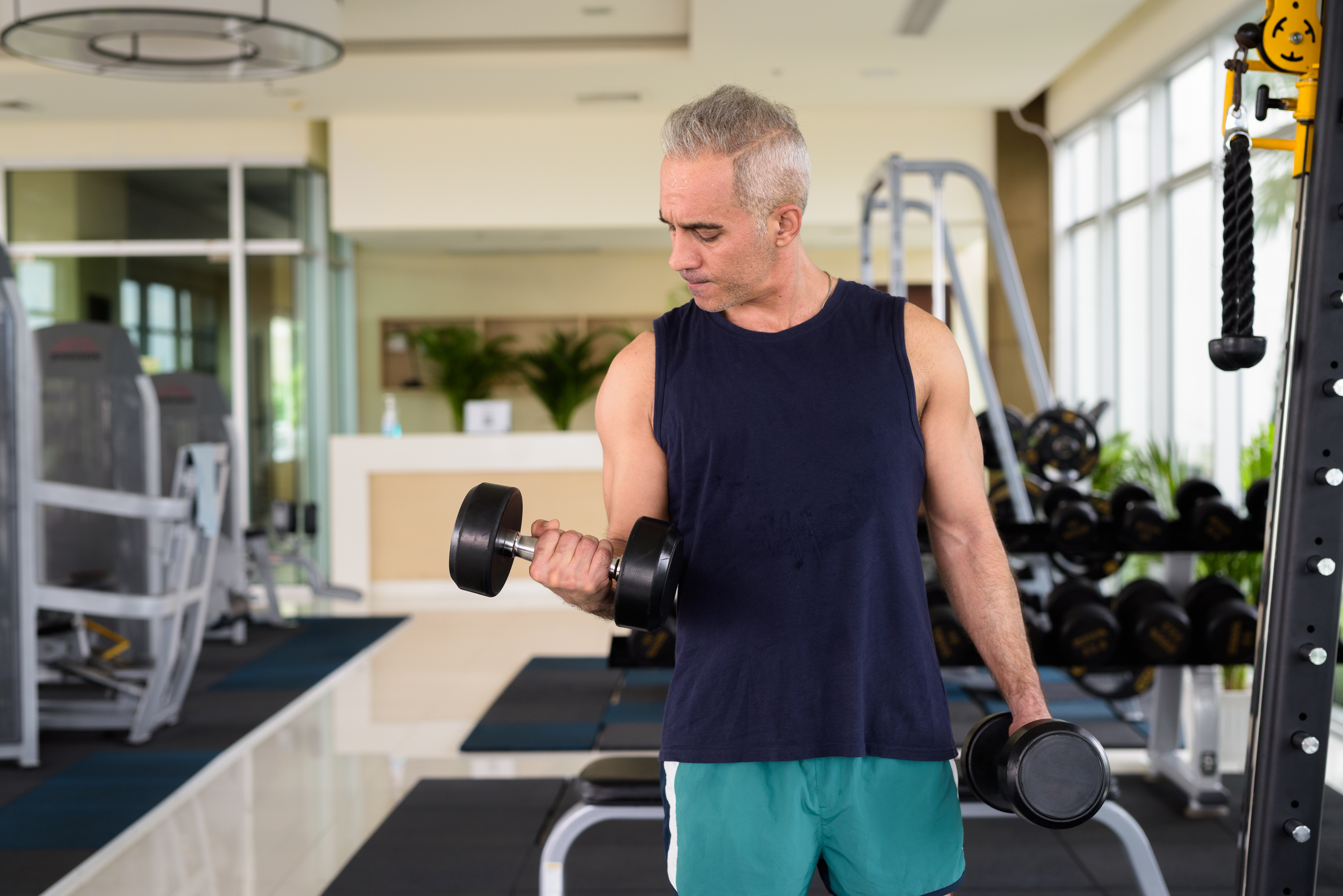 mature-handsome-persian-man-exercising-with-dumbbe-2026-03-18-04-27-27-utc (1)