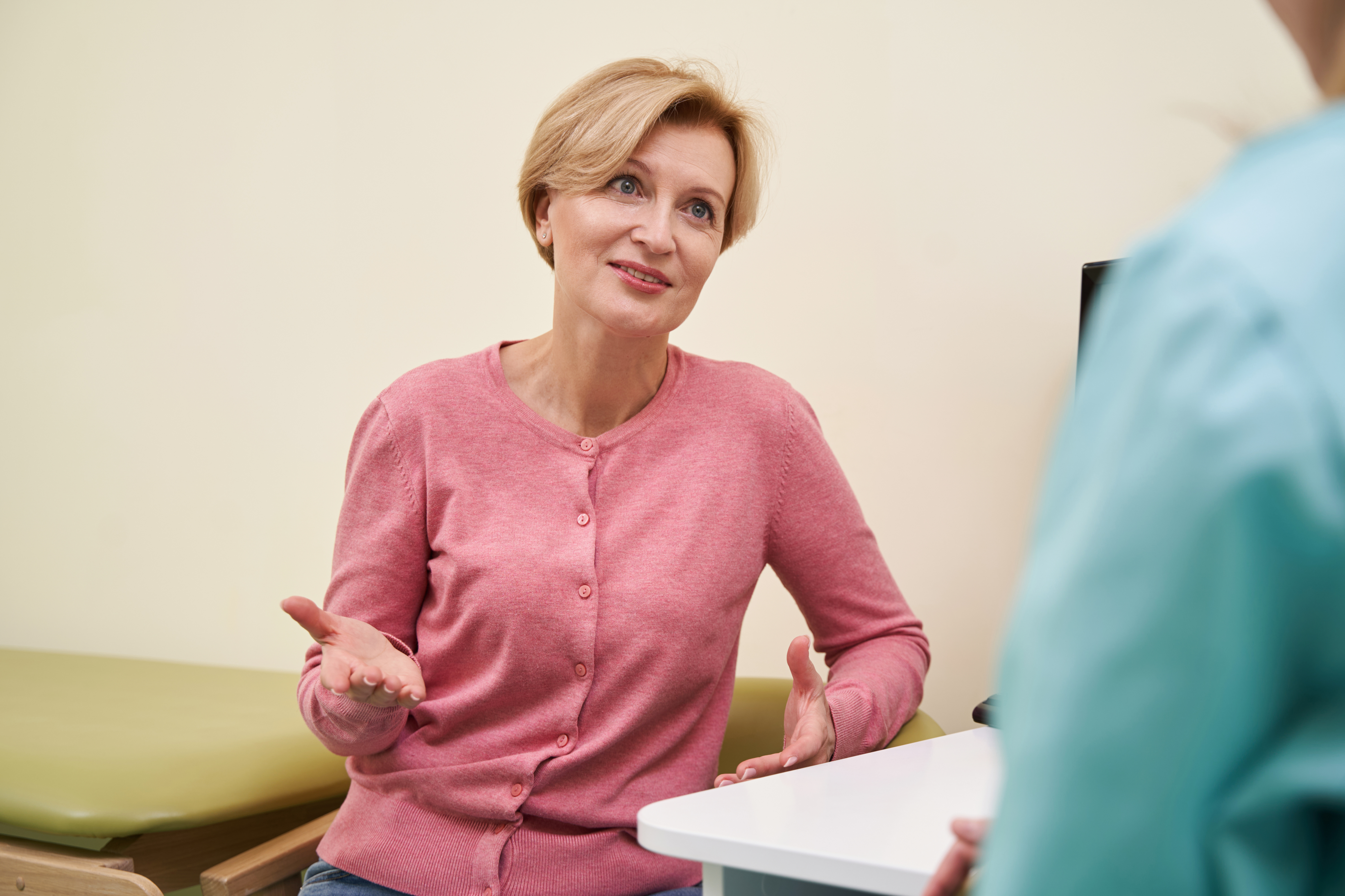 mature-woman-consults-doctor-in-bright-office-2026-03-10-03-58-45-utc